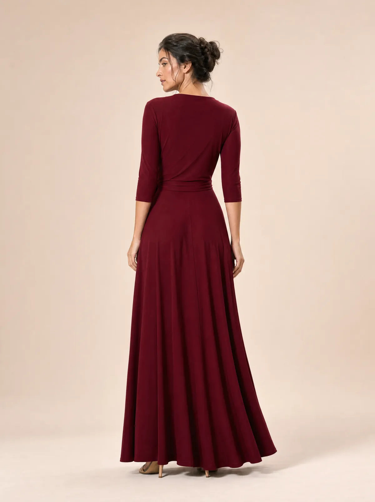 Amara burgundy wrap maxi dress in a full-length back studio view