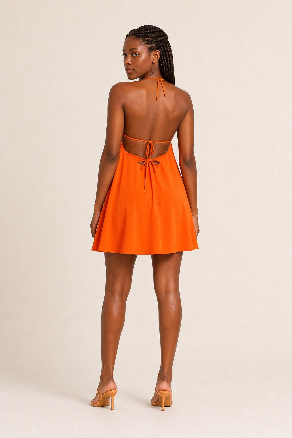 Ava orange cutout swing mini dress - open tie-back view
