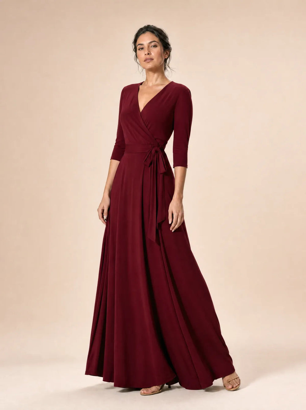 Amara burgundy wrap maxi dress in a front three-quarter studio view