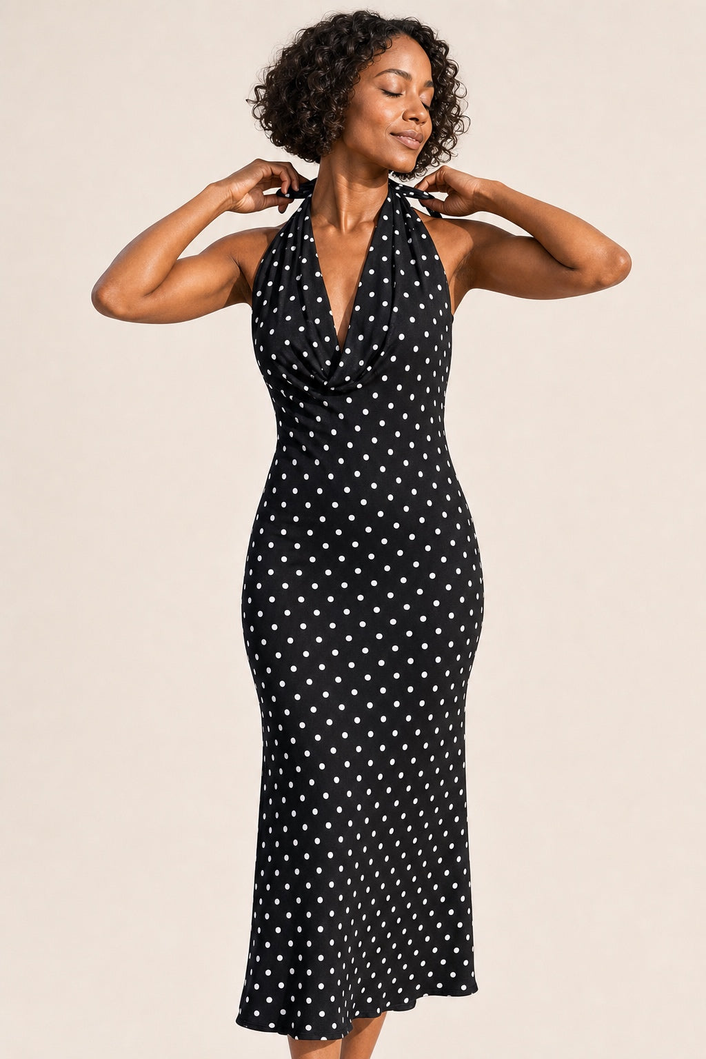 Ruby polka-dot halter midi dress in black - halter detail
