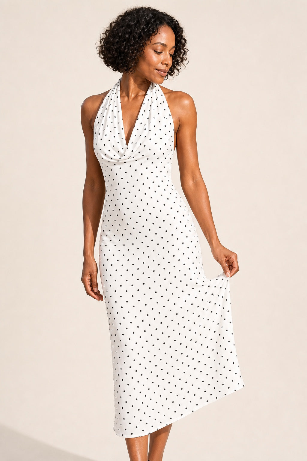 Ruby polka-dot halter midi dress in white - drape and print detail