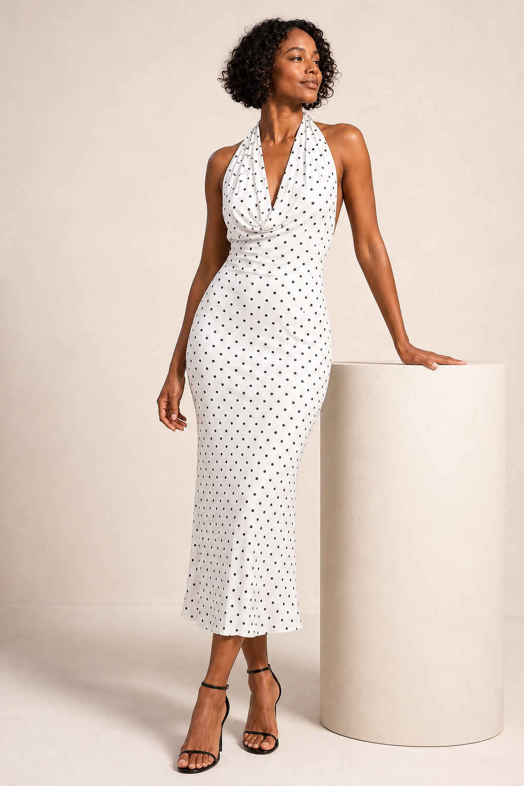 Ruby polka-dot halter midi dress in white - pedestal view