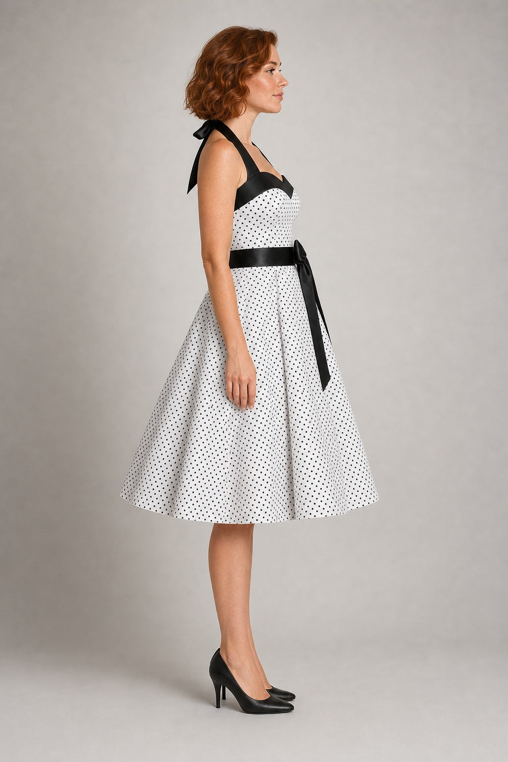 Nora white polka-dot halter swing dress - studio side view